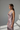 Model wearing Evelyn Draped Cowl Neck Top in Orchid Dust alternate pose