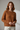 Cinnamon Clay - Model wearing Aurora Ribbed Knit Sweater