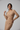 Florence Asymmetric Wrap Top in Sandalwood Beige – model alternate pose