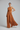 Saffron Clay - Model wearing Charlotte Halter Wide Leg Jumpsuit