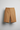 Charlotte Tailored Bermuda Shorts — Driftwood Gold — Front View