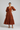 Amelia Tiered Cotton Dress — Rust Mahogany — Model Front
