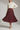 Mulberry Wine - Model wearing Celeste Pleated Midi Skirt