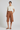 Charlotte Tailored Bermuda Shorts — Mahogany Sand — Model Shot 1