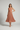 Isabelle Pleated Midi Dress — Copper Blush, model front