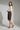 Charlotte Tailored Bermuda Shorts — Aubergine Copper — Model Shot 2