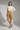 Charlotte Tailored Bermuda Shorts — Driftwood Gold — Model Shot 2