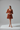 Camille Puff Sleeve Mini Dress in Cinnamon Rust - model alternate pose