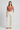 Emilia Knit Polo Top — Terracotta Blush — Model Front
