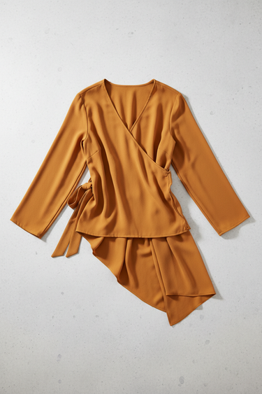 Florence Asymmetric Wrap Top in Dusty Marigold – product back view